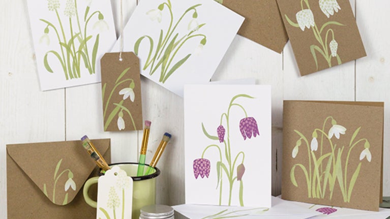 Cards and gift tags printed with a snowdrop design